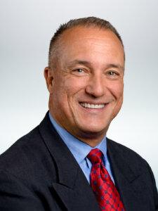 Smiling man in suit and tie